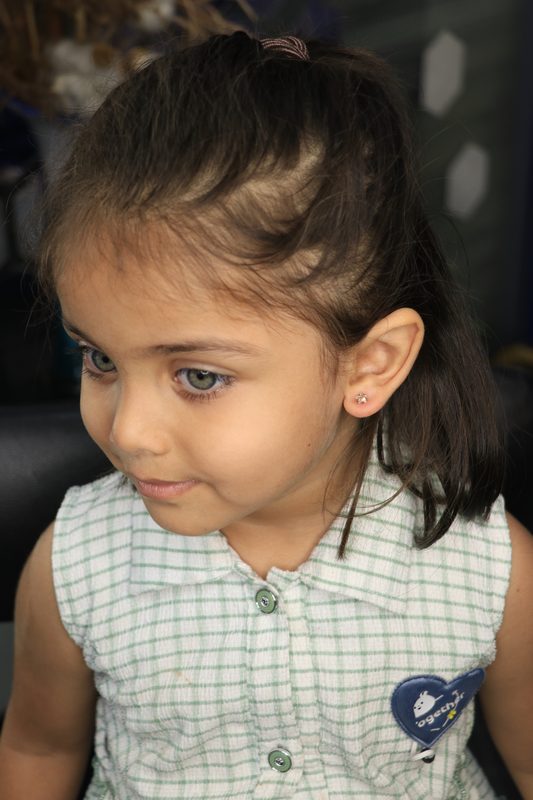 Kids first lobe piercing