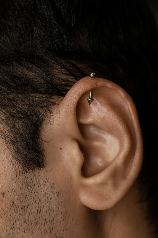 Helix piercing with spike barbell