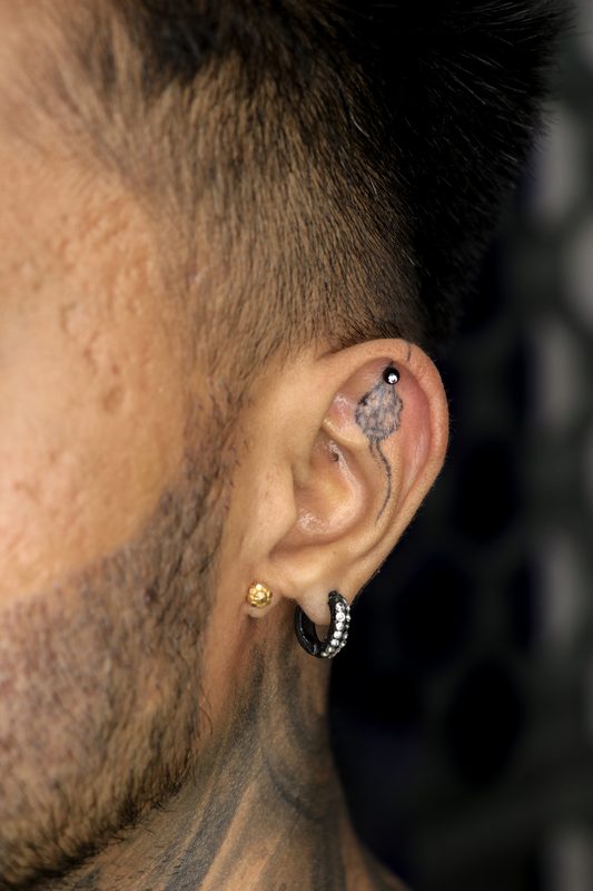 Helix piercing with black bead barbell