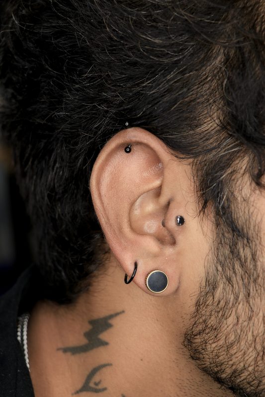 Double helix piercing with beaded studs