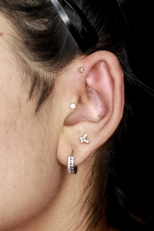 Tragus piercing with round solitaire stud