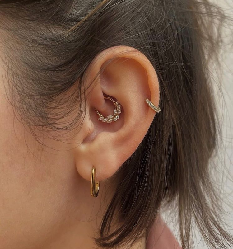 Daith piercing with gold marquise leaf hoop