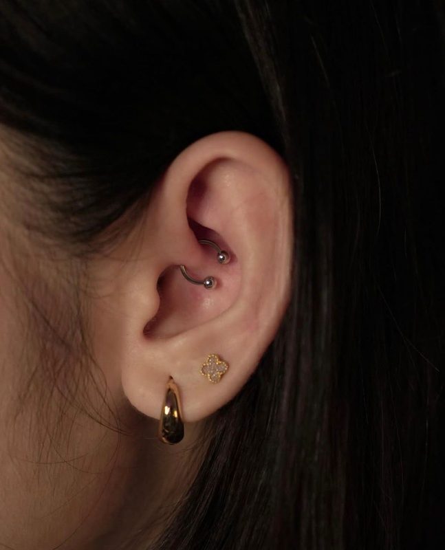 Daith piercing with curved barbell