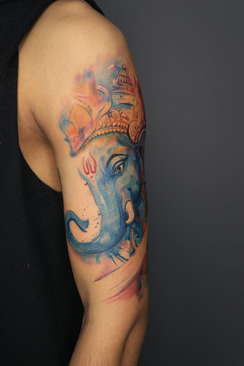Watercolor Ganesha color tattoo
