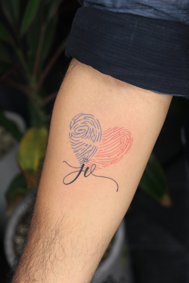 Fingerprint heart blue red tattoo with initials
