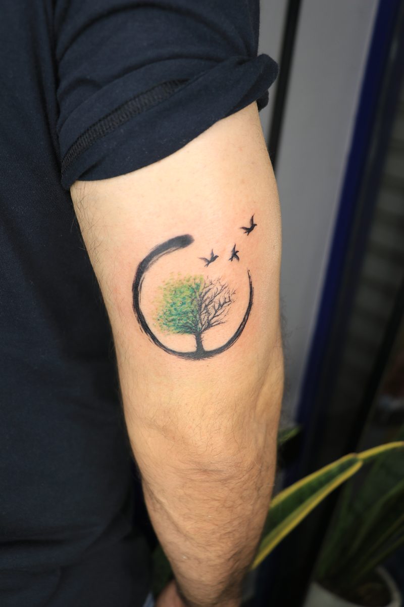 Tree of life enso circle with birds color tattoo