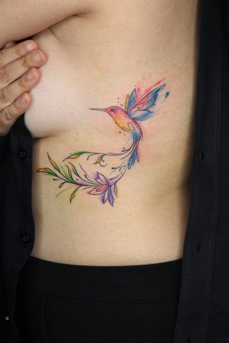Watercolor hummingbird tattoo