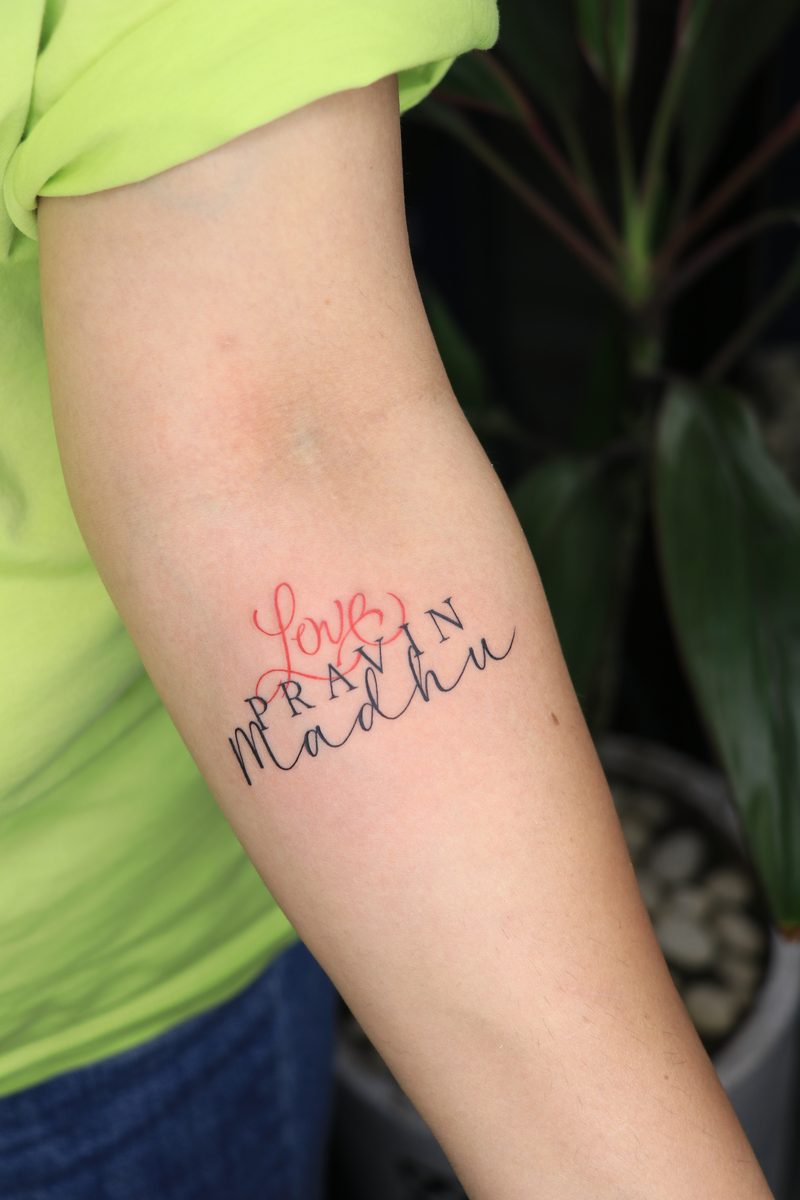 Love couple names calligraphy tattoo