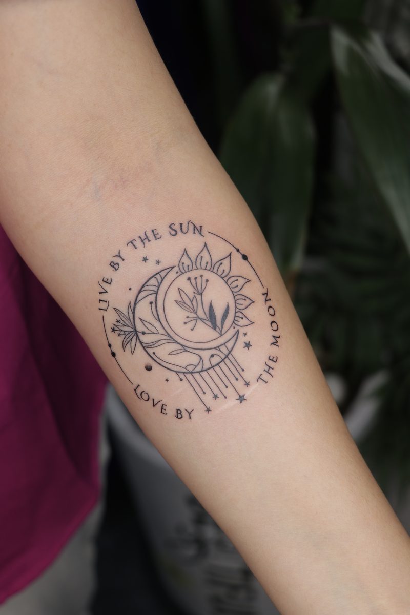 Live by the sun love by the moon fine line tattoo