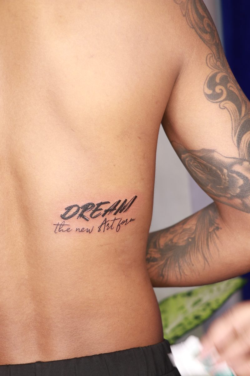Dream the new art form brush script tattoo