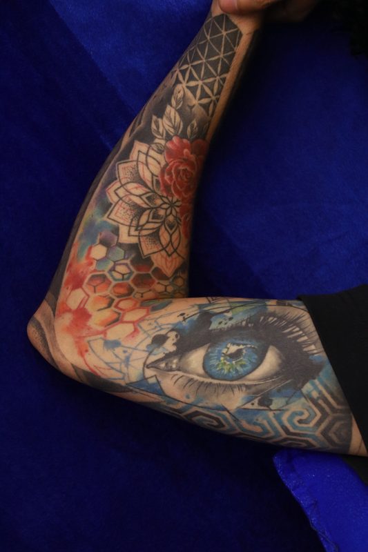 Colour full sleeve tattoo with mandala rose and realistic eye
